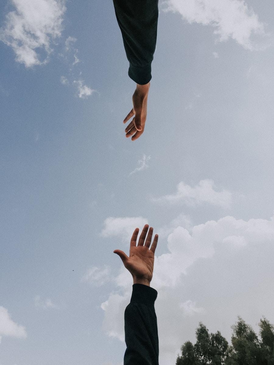 Photo by youssef naddam two person's arms